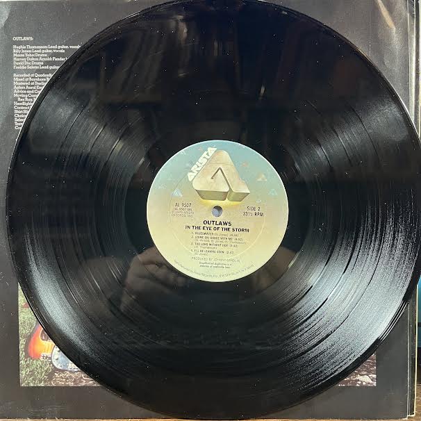 Outlaws - In The Eye Of The Storm (VINYL) | Near Mint- (NM-) Excellent+ (EX+)-