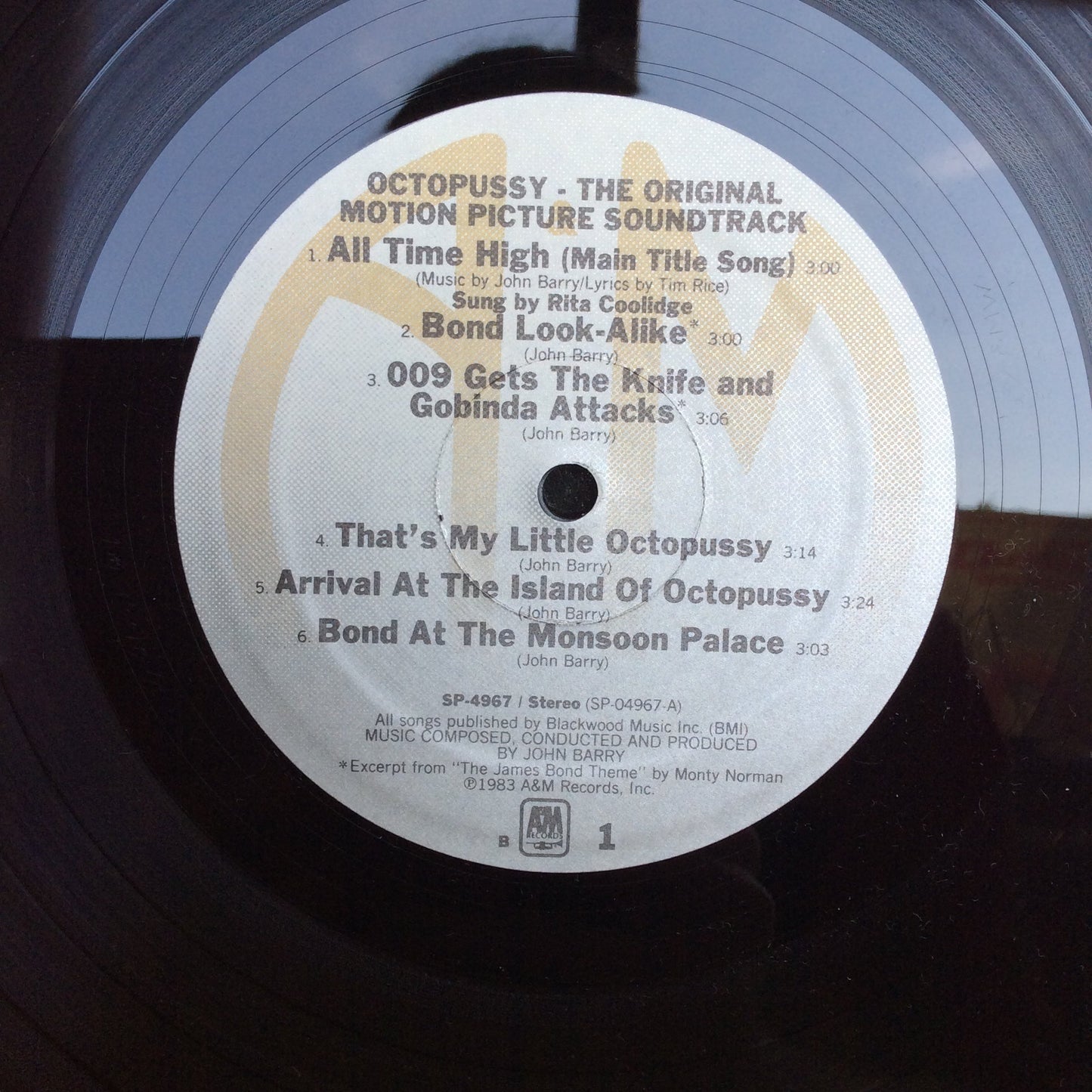 John Barry - Octopussy (Original Motion Picture Soundtrack) (VINYL) | Near Mint- (NM-) Excellent (EX)-
