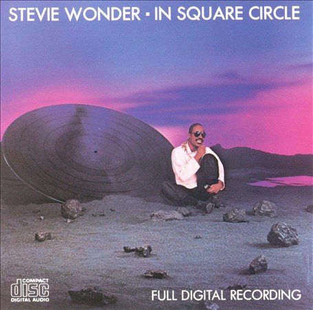 IN SQUARE CIRCLE |-