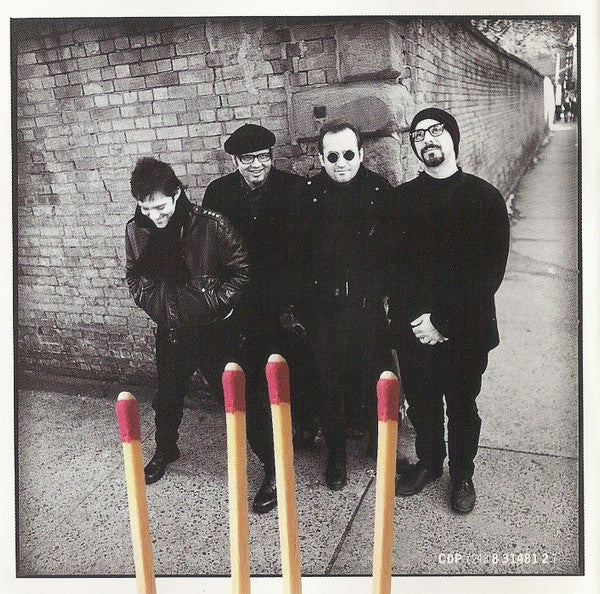 The Smithereens - Blown To Smithereens - Best Of The Smithereens (CD) | Near Mint (NM) Near Mint (NM)-