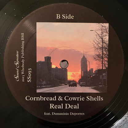 Cornbread & Cowrie Shells For Bertha | Mint (M) Mint (M)-