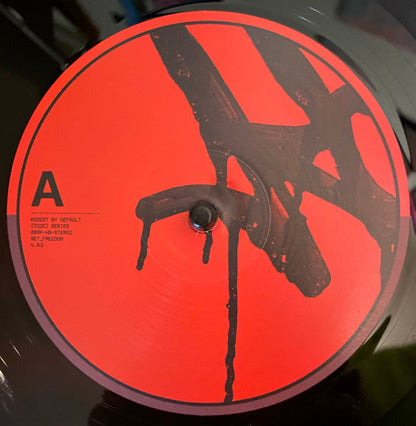 Modest By Default - The Curse Of Colonialism Vol.III | Near Mint (NM) Near Mint (NM)-
