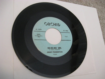 Ko-Ko-Mo Girl / Mathematics Of Love (7") | Very Good (VG) Generic-