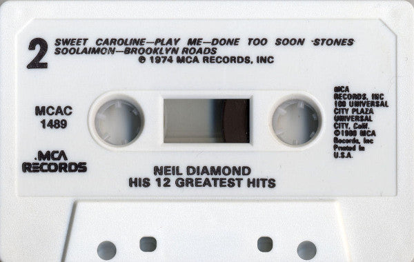 His 12 Greatest Hits (CASSETTE) | Mint (M) Mint (M)-