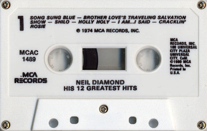 His 12 Greatest Hits (CASSETTE) | Mint (M) Mint (M)-