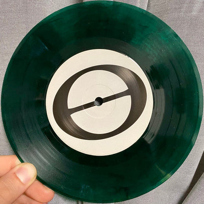 Wake Of Humanity - At Capacity (TRANSPARENT GREEN MARBLE VINYL 7") | Mint (M) Mint (M)-