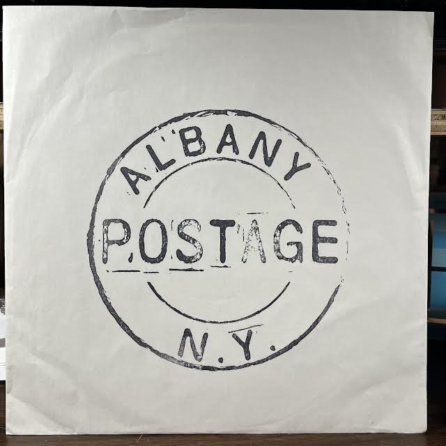 Postage (2) - Postage (VINYL) | Near Mint (NM or M-)--