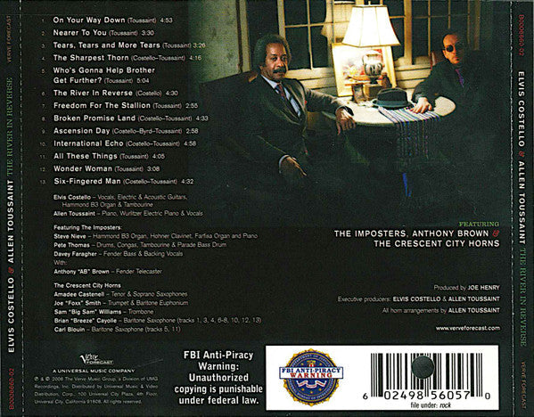 Elvis Costello - The River In Reverse (CD) | Near Mint- (NM-) Excellent (EX)-