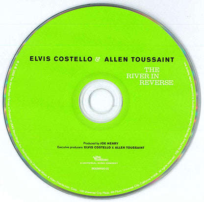 Elvis Costello - The River In Reverse (CD) | Near Mint- (NM-) Excellent (EX)-