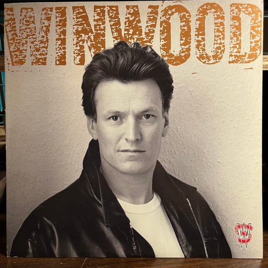 Steve Winwood - Roll With It (VINYL) | Near Mint- (NM-) Excellent+ (EX+)-