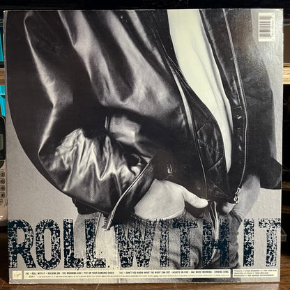 Steve Winwood - Roll With It (VINYL) | Near Mint- (NM-) Excellent+ (EX+)-