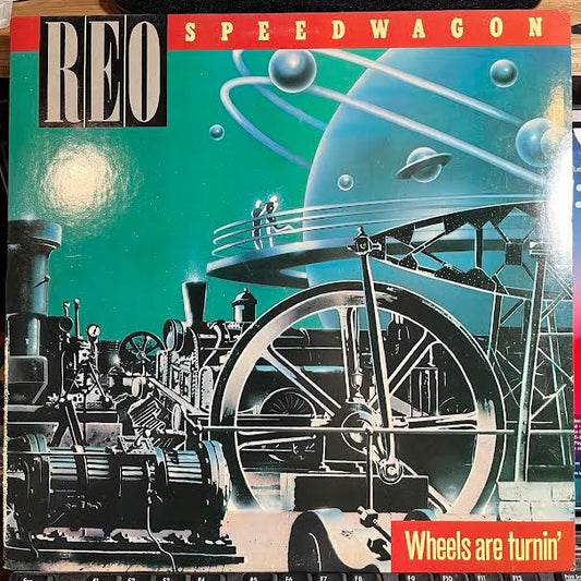 REO Speedwagon - Wheels Are Turnin' (VINYL) | Near Mint- (NM-) Excellent (EX)-