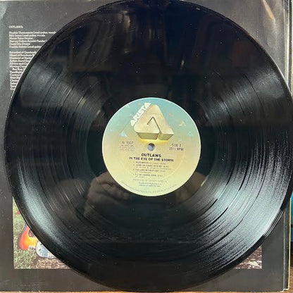 Outlaws - In The Eye Of The Storm (VINYL) | Near Mint- (NM-) Excellent+ (EX+)-