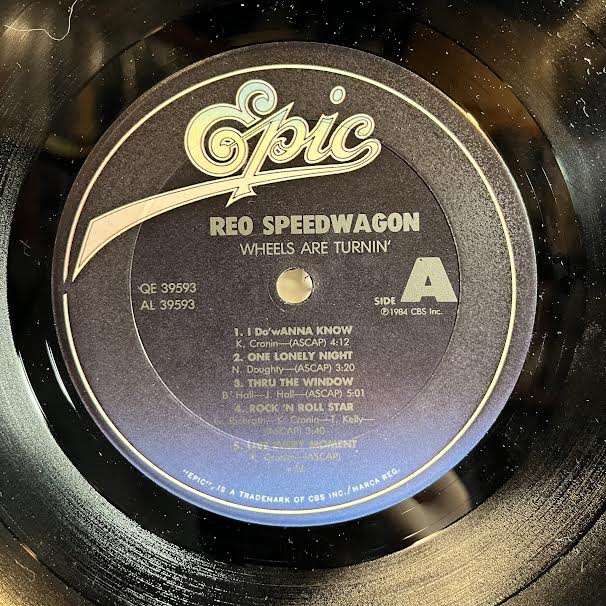 REO Speedwagon - Wheels Are Turnin' (VINYL) | Near Mint- (NM-) Excellent (EX)-