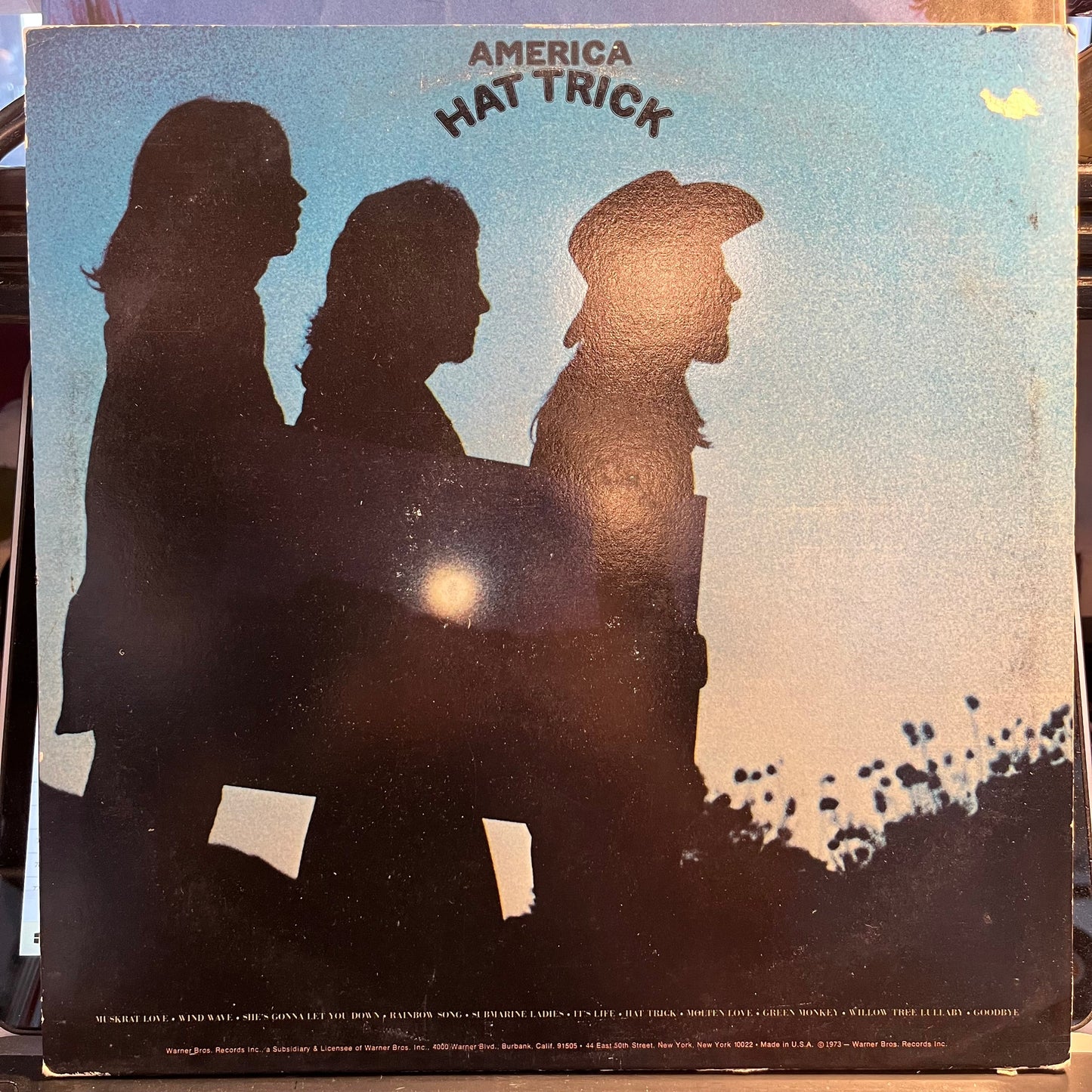 America (2) - Hat Trick (VINYL) | Near Mint (NM) Excellent (EX)-