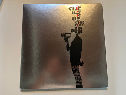 The Cinematic Orchestra - Man With A Movie Camera (SIGNED / COLOR 2xVINYL) | Mint (M) Mint (M)-