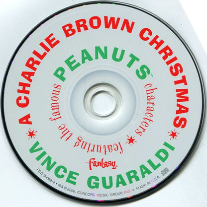 Vince Guaraldi - "A Charlie Brown Christmas" Featuring The Famous Peanuts Characters (Original Sound Track) (3xCD) | Near Mint (NM) Near Mint (NM)-